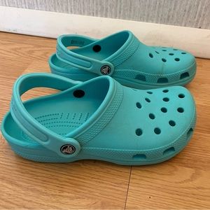 Turquoise crocs